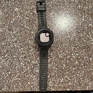 Garmin Instinct Digital Watch. Comes with the original charging chord.